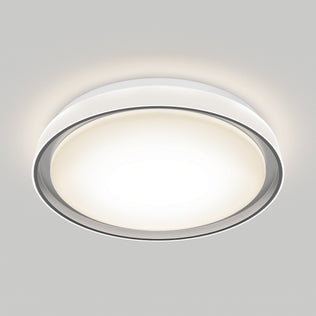 The Artika Niko 15.5 in. modern LED flush mount light features a white diffused cover and a subtle metallic ring, delivering bright, even illumination to any light gray ceiling with selectable color temperatures.