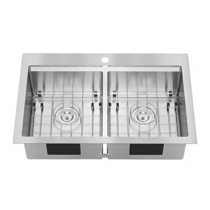 The Artika Newport double bowl stainless steel sink features a center faucet hole and protective grates in each bowl, shown from a top-down perspective.