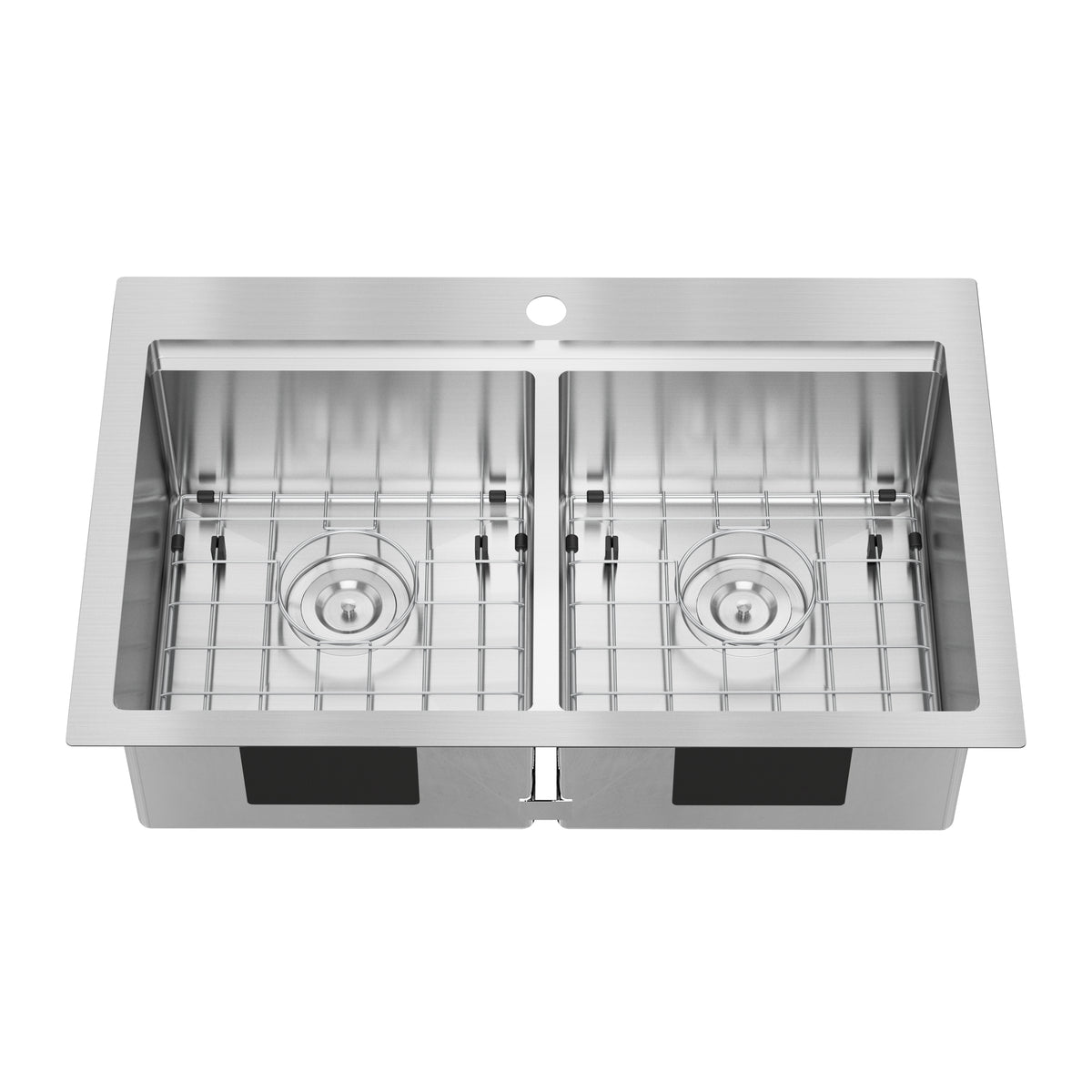 A stainless steel double-basin kitchen sink with square corners, a central faucet hole, and removable metal grids at the bottom of each basin.