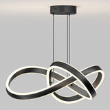 Modern ceiling light fixture with intertwined black and white LED loops, suspended by two thin rods from a round black ceiling mount, set against a plain light gray background.