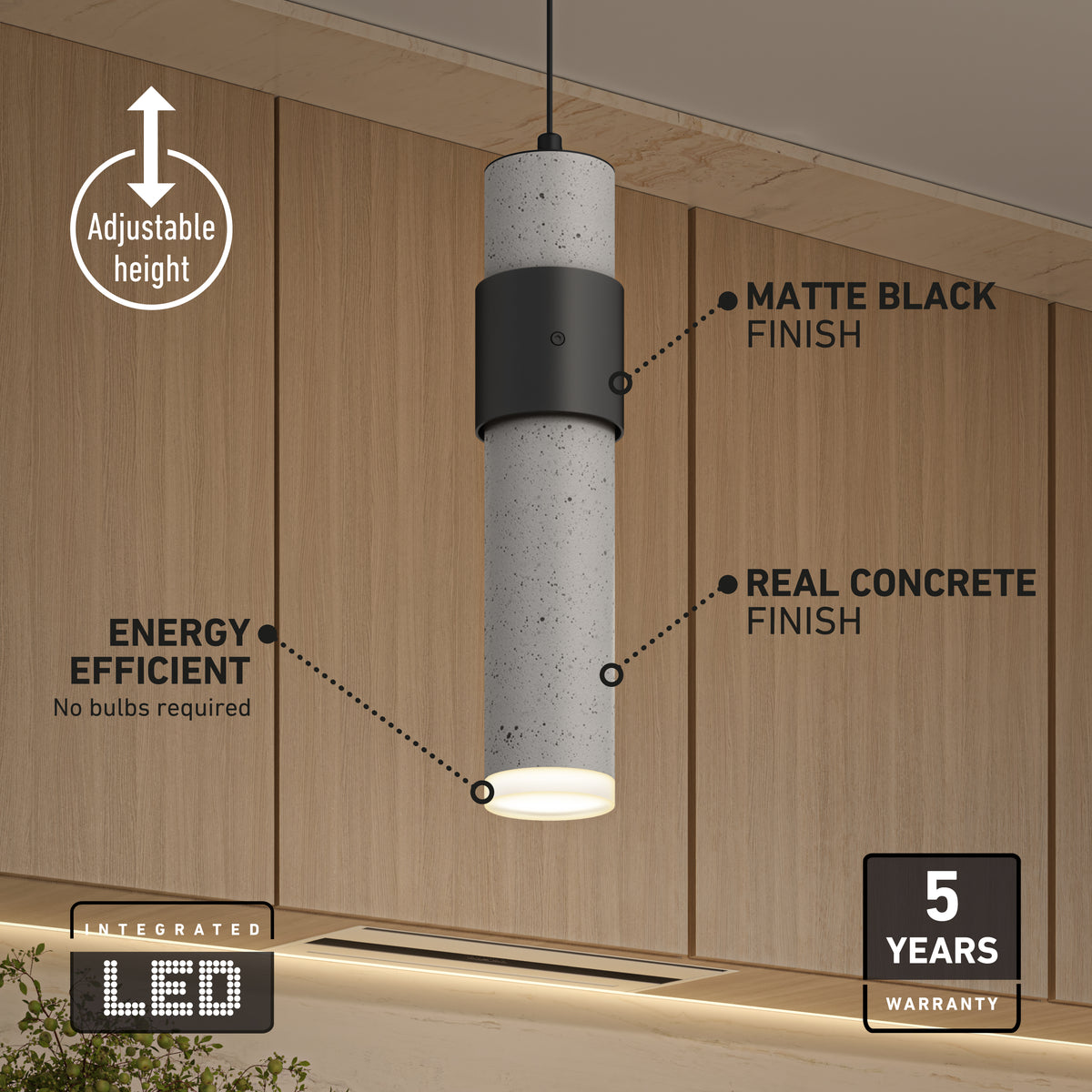 A modern cylindrical pendant light with a matte black and real concrete finish hangs in a kitchen with wood cabinets. Text highlights its adjustable height, energy efficiency, integrated LED, and 5-year warranty.