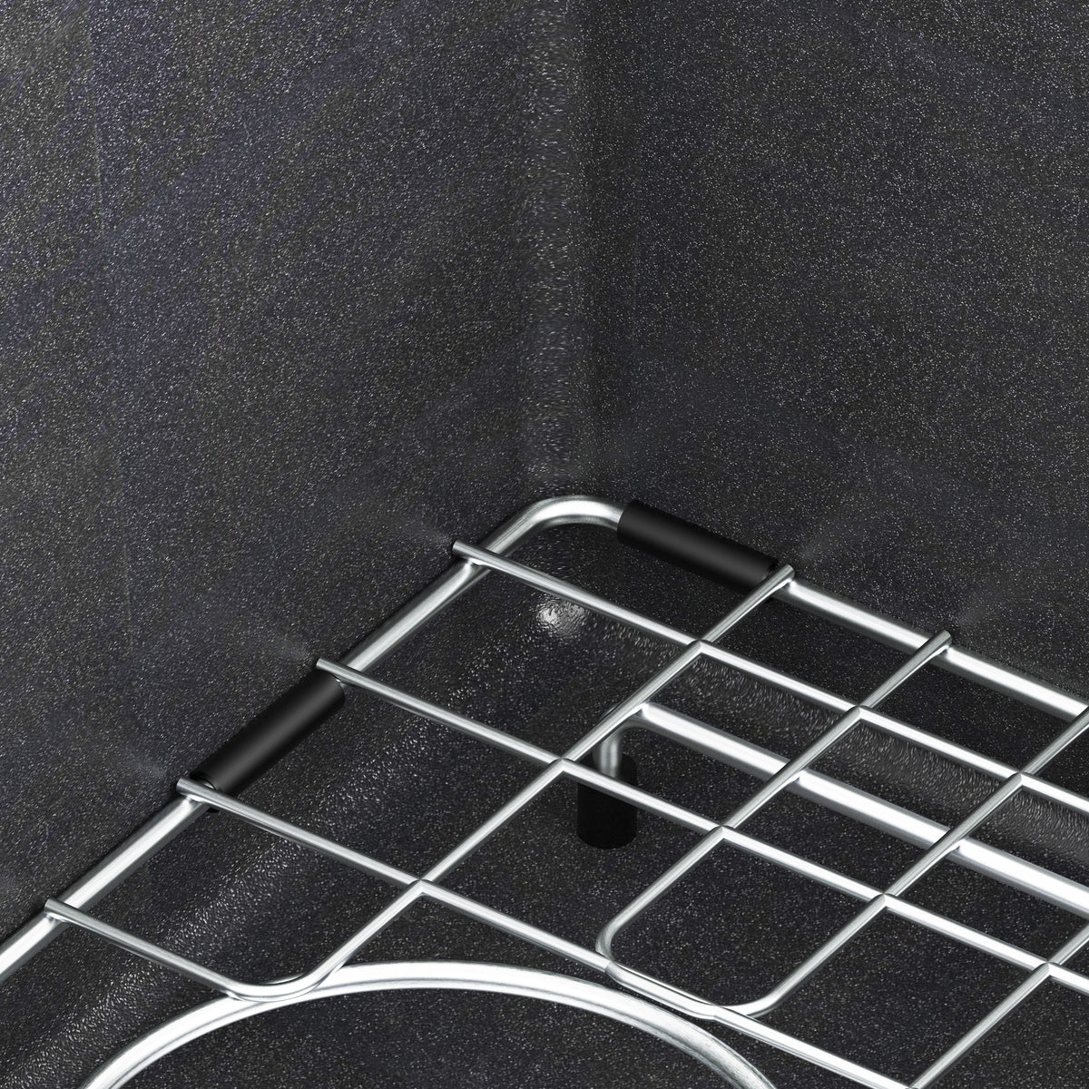 Close-up of the Artika Baycrest 33 in. black double bowl kitchen sink installed in a textured dark countertop.