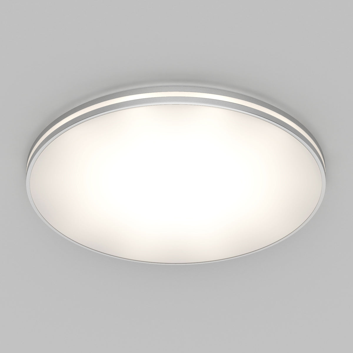 Artika GLOW 30 in. LED Flush Mount Ceiling Light, 5 CCT with Remote, round & modern, lit against a plain light gray background.