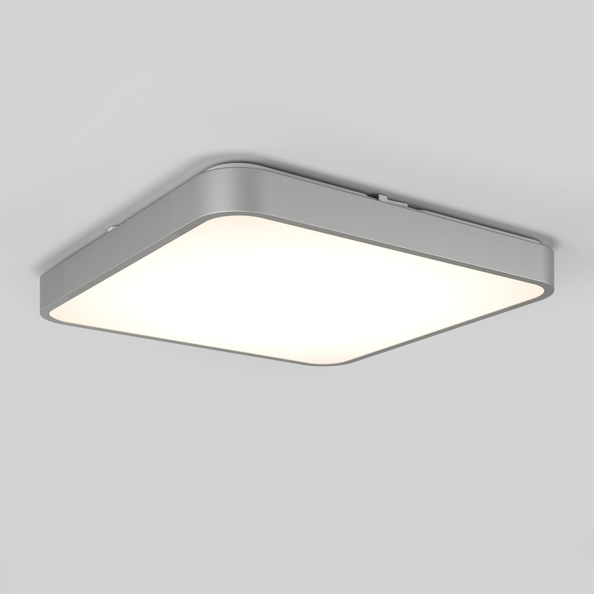 The Artika Europa 18 in. LED flush mount light features a modern square design with rounded corners, a sleek gray frame, and bright, even illumination—perfect for any white ceiling. Includes remote control for added convenience.