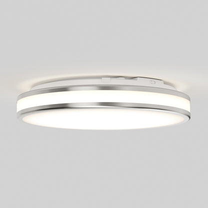 The Artika Hemisphere 15 in. LED flush mount light features a circular design with a metallic rim and frosted diffuser, offering adjustable brightness (5 CCT) for soft, even bathroom lighting on your white ceiling.