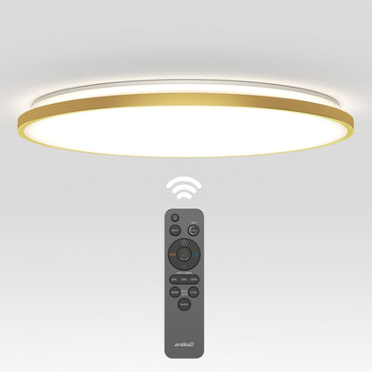 A modern, round ceiling light with a gold rim is shown illuminated, accompanied by a wireless remote control featuring various buttons for adjusting settings.