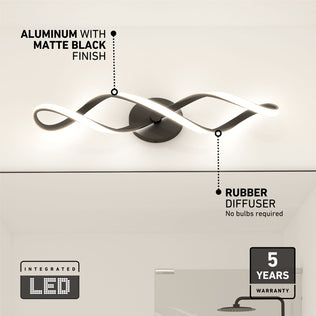 The Artika Swirl LED bathroom vanity light features a wavy aluminum body in matte black, integrated LEDs with a rubber diffuser, and a 5-year warranty. No bulbs needed—modern design and reliable lighting for your space.