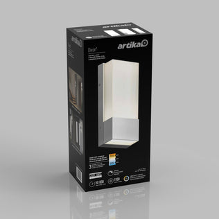 A black box for the Artika Dixon indoor-outdoor LED wall light shows a photo of the fixture, key product details, brightness and longevity icons, plus images of possible installation settings.