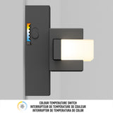 A modern wall-mounted light fixture with a rectangular light and a built-in color temperature switch, showing adjustable color temperature levels on a small vertical indicator.