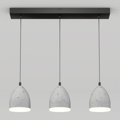 The Artika Bergen 3-light LED pendant features gray, speckled, dome-shaped shades suspended from a sleek black rectangular ceiling mount against a plain light background.