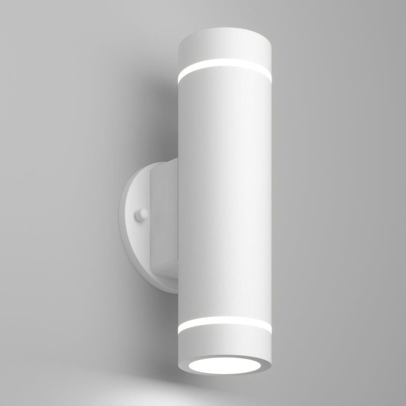 The Artika C7 indoor-outdoor LED wall light 3 CCT is a modern, cylindrical white sconce with a minimalist design that mounts vertically and emits light from both the top and bottom.