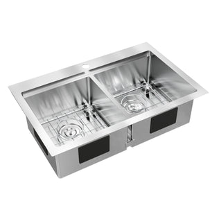 The Artika Newport twin bowl 33 in. stainless steel workstation sink features a flat rim, two metal grids (one per basin), and a faucet hole centered on the back edge.