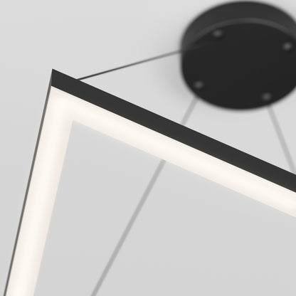 A close-up of the Artika Artemis LED pendant light 3 CCT, featuring a modern angular design, suspended by thin wires with its black ceiling mount visible in the background.