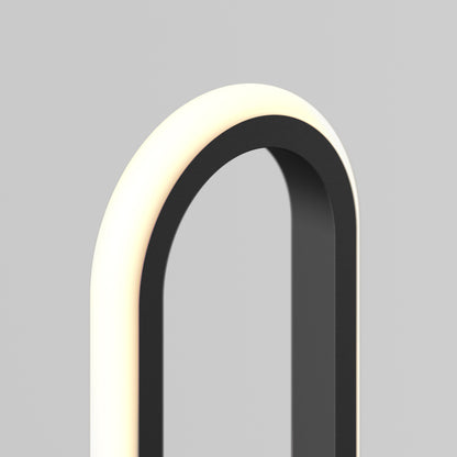 The Artika Leni dimmable LED modern floor lamp features a sleek black curved frame and built-in white LED light, showcased against a plain light grey background.