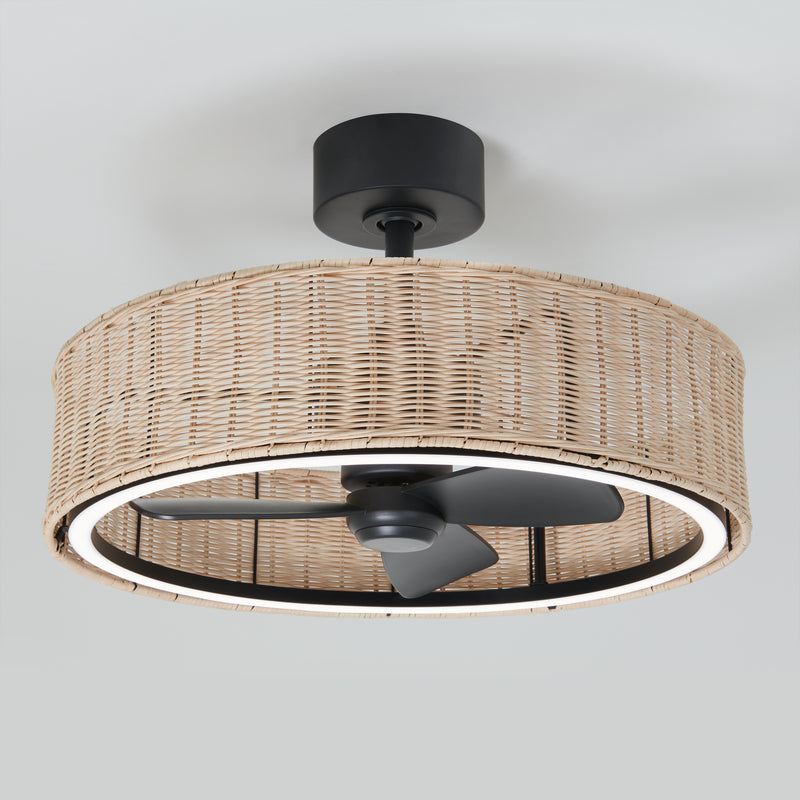 The Artika Kalani 24 in. LED modern ceiling fan features black blades and mount, a circular woven wicker shade with an LED light ring, and includes 3 speeds plus remote control, all set against a light gray background.