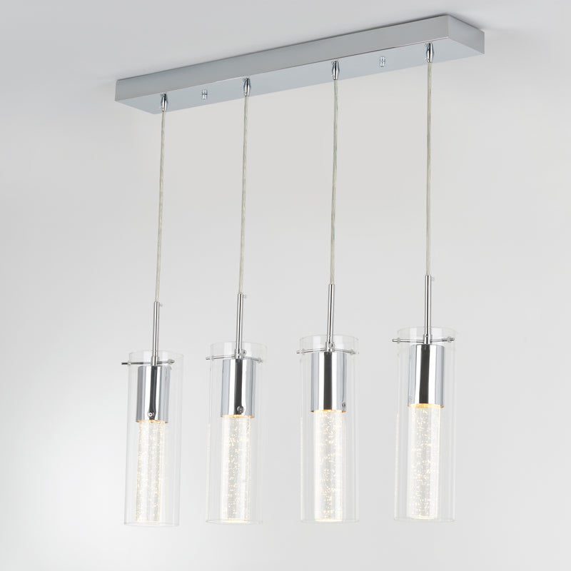 The Artika Bubble Flow 4-light pendant features four cylindrical glass lights with illuminated inner tubes, suspended from a rectangular chrome base against a plain white ceiling.