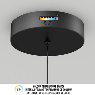 Close-up of the Artika Colin LED modern planter pendant light 5 CCT’s black canopy, featuring a color temperature switch above the cord. The highlighted switch lets you choose from multiple warm to cool light color options as described below.