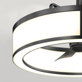 Close-up view of a modern ceiling fan with a circular LED light fixture, featuring a black metal frame and sleek, minimalist design against a neutral, light background.