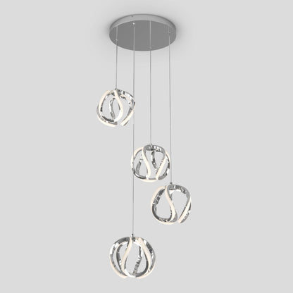 The Artika Vivaldi LED 4-light pendant is a chandelier that hangs from the ceiling.