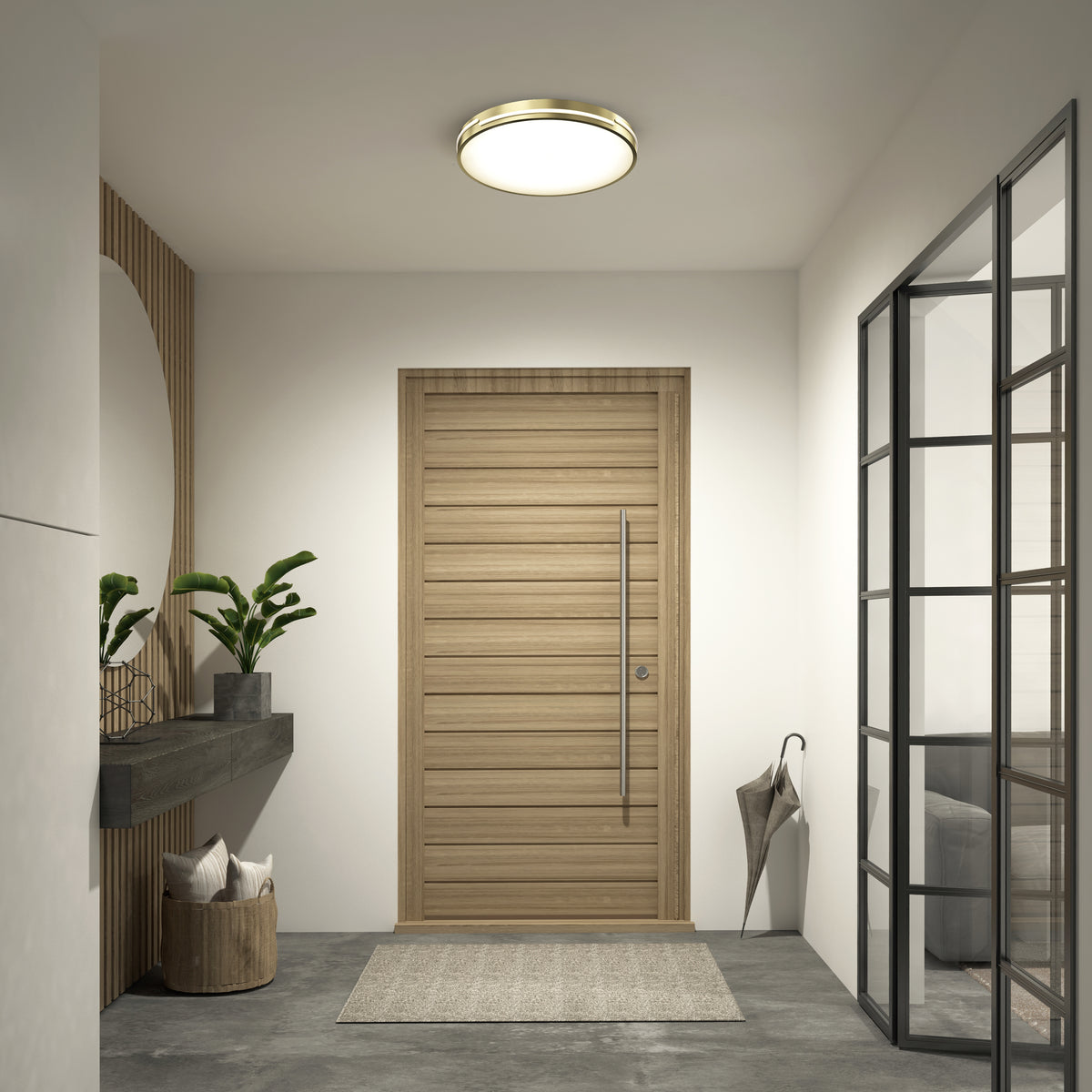 A modern entryway with a wooden door, a round ceiling light, a gray rug, a wall shelf with plants and pillows, a basket, a large circular mirror, and a glass partition. An umbrella rests by the door.