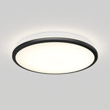 A round, modern ceiling light fixture with a black outer rim and a white frosted center, mounted on a plain white ceiling and emitting a soft, even glow.