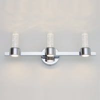 The Artika Novello modern LED bathroom vanity light features three cylindrical glass shades and a sleek chrome finish.