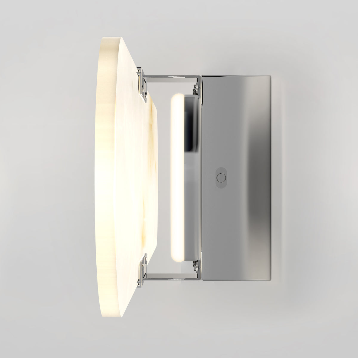 A modern wall-mounted light fixture with a rectangular metal base and a rounded, illuminated panel attached, shown from a side angle against a plain light background.