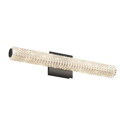 The Exalto LED bathroom vanity light by Artika features a modern cylindrical textured glass shade mounted horizontally on a sleek rectangular black metal base.