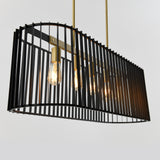 A modern pendant light fixture with exposed bulbs, surrounded by a black metal cage with vertical slats, suspended from the ceiling by two brass rods.