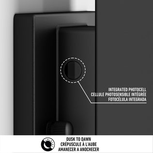 Close-up of Artika’s Linea Square LED indoor-outdoor wall light 3 CCT, featuring a circular integrated photocell sensor labeled in English, French, and Spanish. Below, “Dusk to Dawn” appears with a symbol in three languages.
