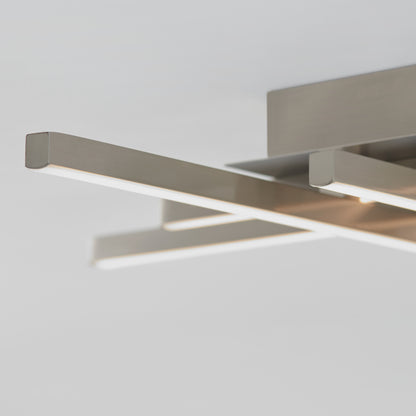 Close-up of the Artika Grid LED flush mount, featuring sleek, overlapping metallic bars and integrated LED strips, set against a plain white background.