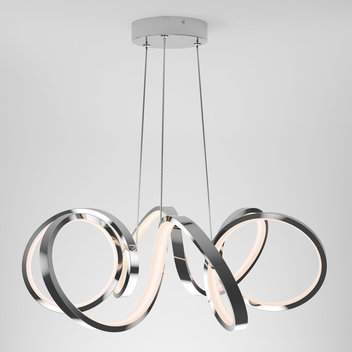 The Artika-CAN-dev Swirl Ribbon LED pendant light features three interlocking matte black rings suspended by thin wires, emitting soft white light from integrated LEDs along the inner edges against a plain white background.