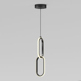 The Artika Catena LED pendant light features two intersecting oval LED rings hanging vertically from a black ceiling mount, showcasing a sleek, modern design. Adjustable to 5 CCTs, its perfect for minimalist interiors.