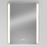 A rectangular wall-mounted mirror with rounded edges features vertical LED light strips on both sides and touch control icons at the bottom center. The mirror has a modern, minimalist design.