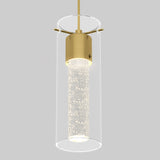 A modern pendant light with a cylindrical glass shade, gold metal accents, and an inner frosted tube filled with small bubbles, suspended against a plain gray background.