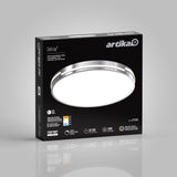 A black box packaging for an Artika LED flush mount light fixture, model Delray, featuring an image of the round light, product details, and icons for brightness, energy efficiency, and lifespan on a gray background.