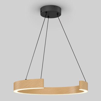 A modern pendant light with a circular, wood-finished ring, suspended by three black cords from a round black ceiling mount, against a plain gray background. The inner edge of the ring emits a soft white light.