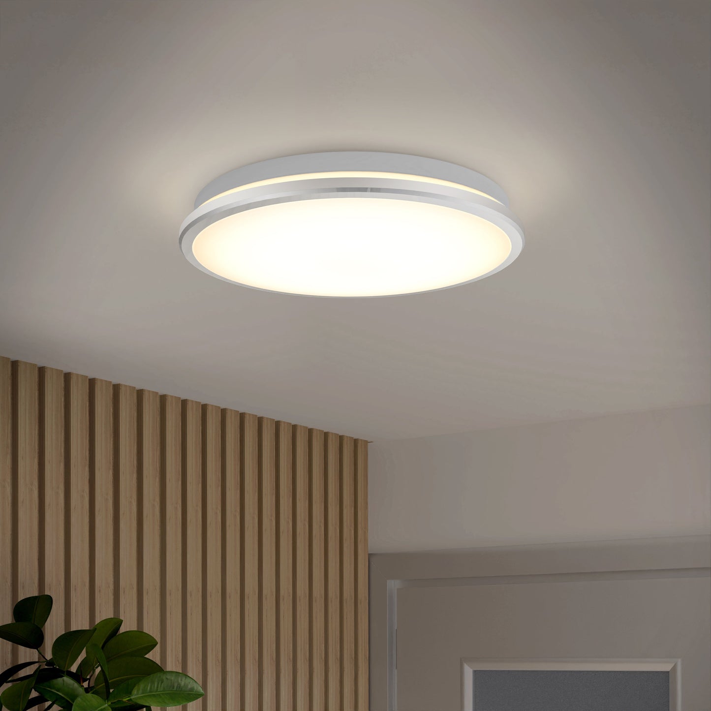 The Vera 13 in. LED modern flush mount light by Artika-CAN-dev features a matte black finish, emits a soft warm glow in rooms with white ceilings and wood slat walls, and is compatible with LED dimmers for customizable ambiance.