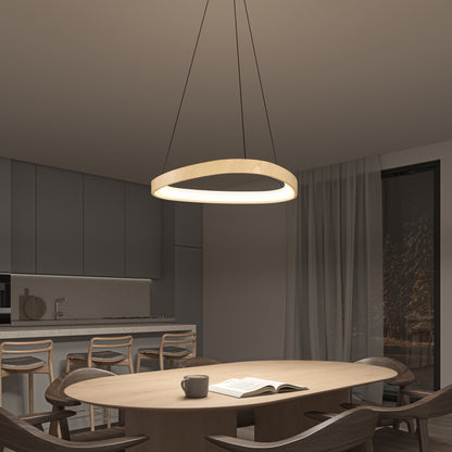 A modern dining room features a round wooden table, six chairs, an open book, a mug, and the Artika Bjorn modern LED pendant light 5 CCT hanging above. Gray cabinets, bar stools, and a large window with sheer curtains complete the space.