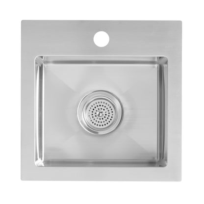 The Artika Plaza Bar Single Bowl Sink is a stainless steel sink seen from above, featuring a square basin with rounded corners, a central drain, and a circular faucet hole at the back.