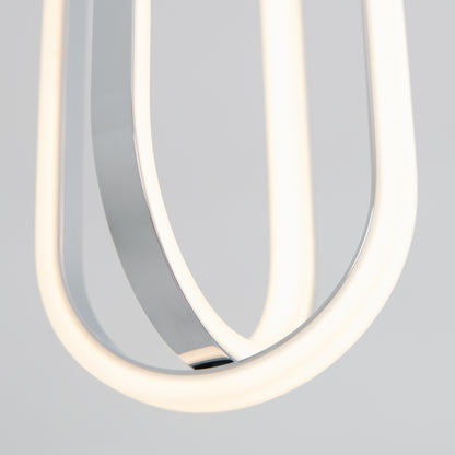 Close-up of the Arlo 1-light LED pendant by Artika, featuring curved, glowing white LED strips and a reflective metal surface against a plain light gray background.