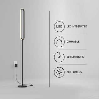 The Artika Leni dimmable LED modern floor lamp stands in a gray room, showcasing its integrated LED, 700 lumens brightness, dimmable feature, and 50,000-hour lifespan with sleek minimalist black design.