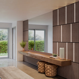 Modern entryway with Artika Lumilok LED Wall Panel Light for Sonolok, floating wood console, plants, and woven baskets below.