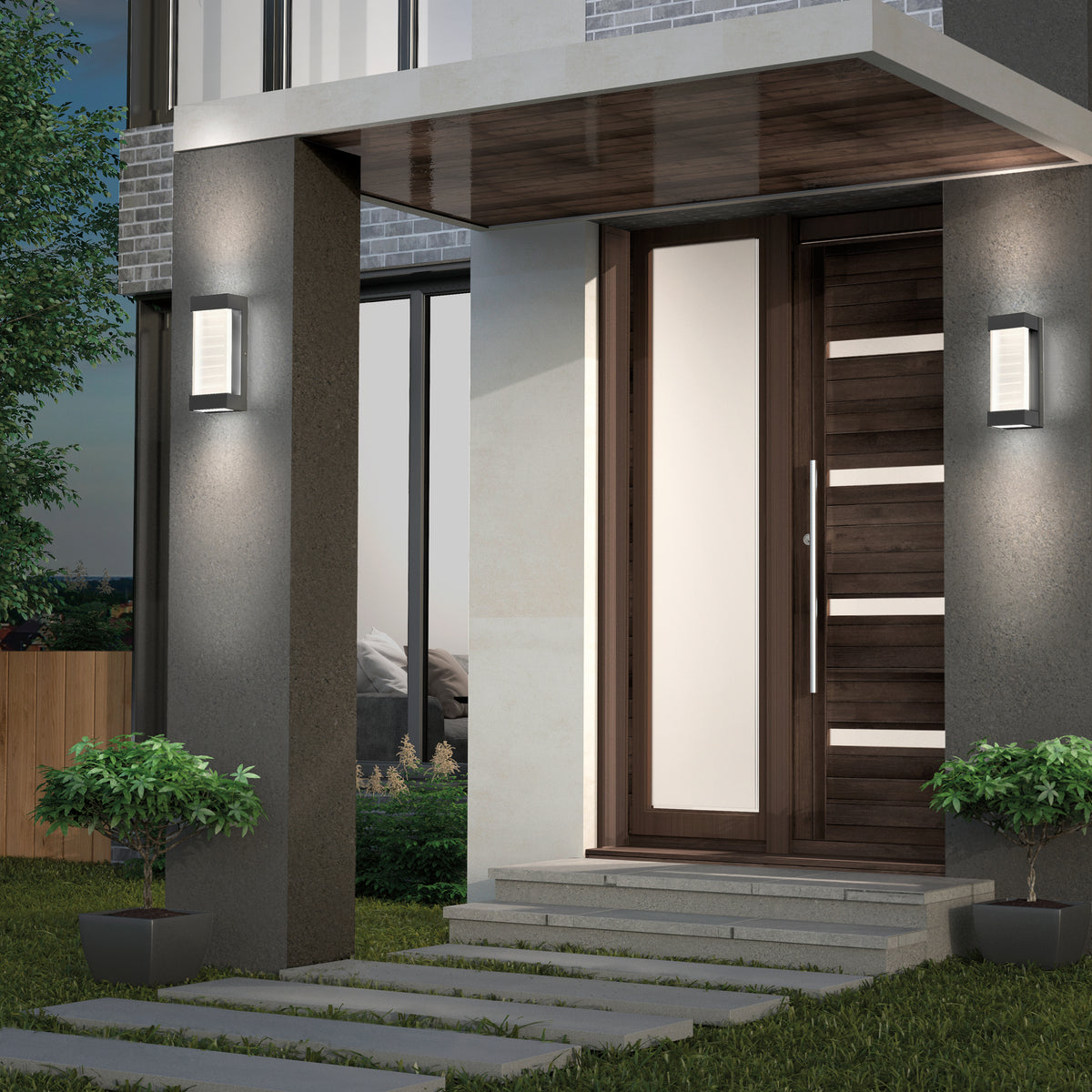 Modern house entrance with a wooden door featuring a vertical frosted glass panel, two wall-mounted lights, potted plants on either side, and concrete stepping stones leading to the steps.