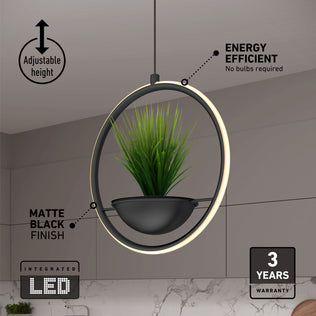 The Colin LED modern planter pendant light 5 CCT by Artika is shown in a kitchen, featuring a matte black ring, integrated planter, adjustable height, energy-efficient LEDs (no bulbs needed), 3-year warranty, and stylish matte black finish.