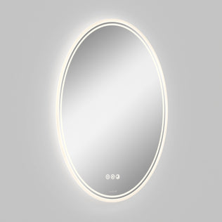 The Artika Corby 22 in. x 28 in. LED mirror features a built-in edge light, three touch buttons at the bottom center, and a defogger. Shown wall-mounted against a plain light gray background.