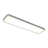 Rectangular, modern ceiling light fixture with a slim, gray frame and a frosted white surface, emitting a soft, even light. The design is minimalistic and contemporary.