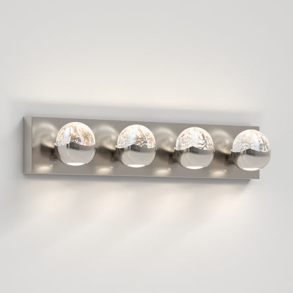 The Artika Oracle 4 light LED bathroom vanity light features four round, chrome-finished glass shades on a rectangular metallic base, providing modern illumination for your space.