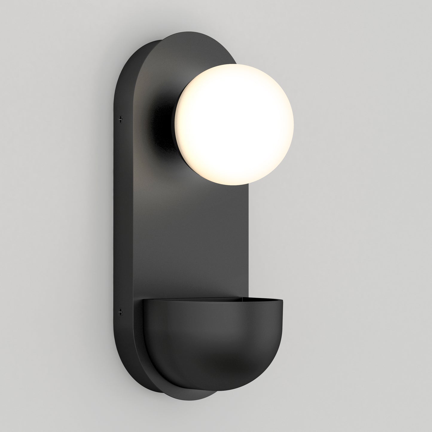 The Artika Bloomfield LED modern mid-century wall sconce 5 CCT features a black finish, a round frosted white globe on top, and a curved bowl-like base, shown mounted on a light gray wall.