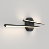A modern wall sconce with two slim, horizontal LED light bars extending from a round black base, casting a soft glow on a plain light gray wall.
